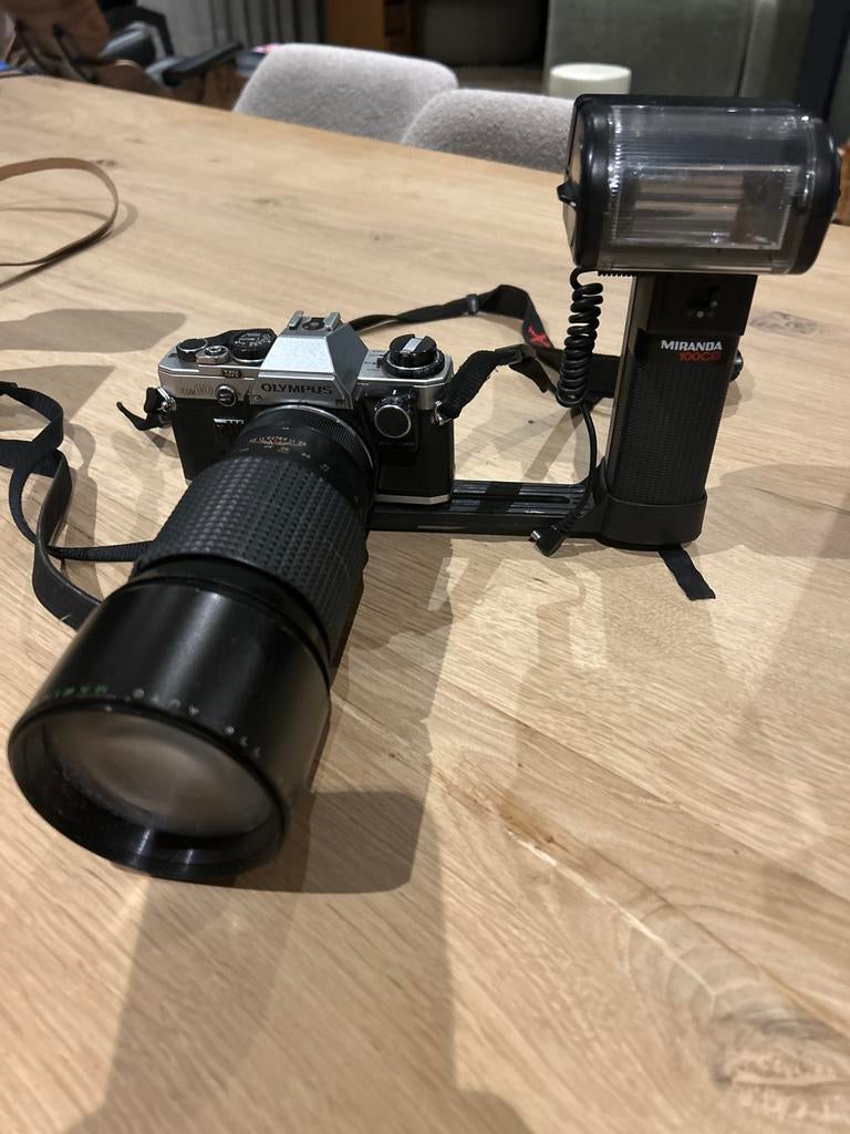 Olympus OM10 Spiegelreflexcamera met Miranda 100CB flitser, Audio, Tv en Foto, Fotocamera's Analoog, Ophalen of Verzenden, Gebruikt