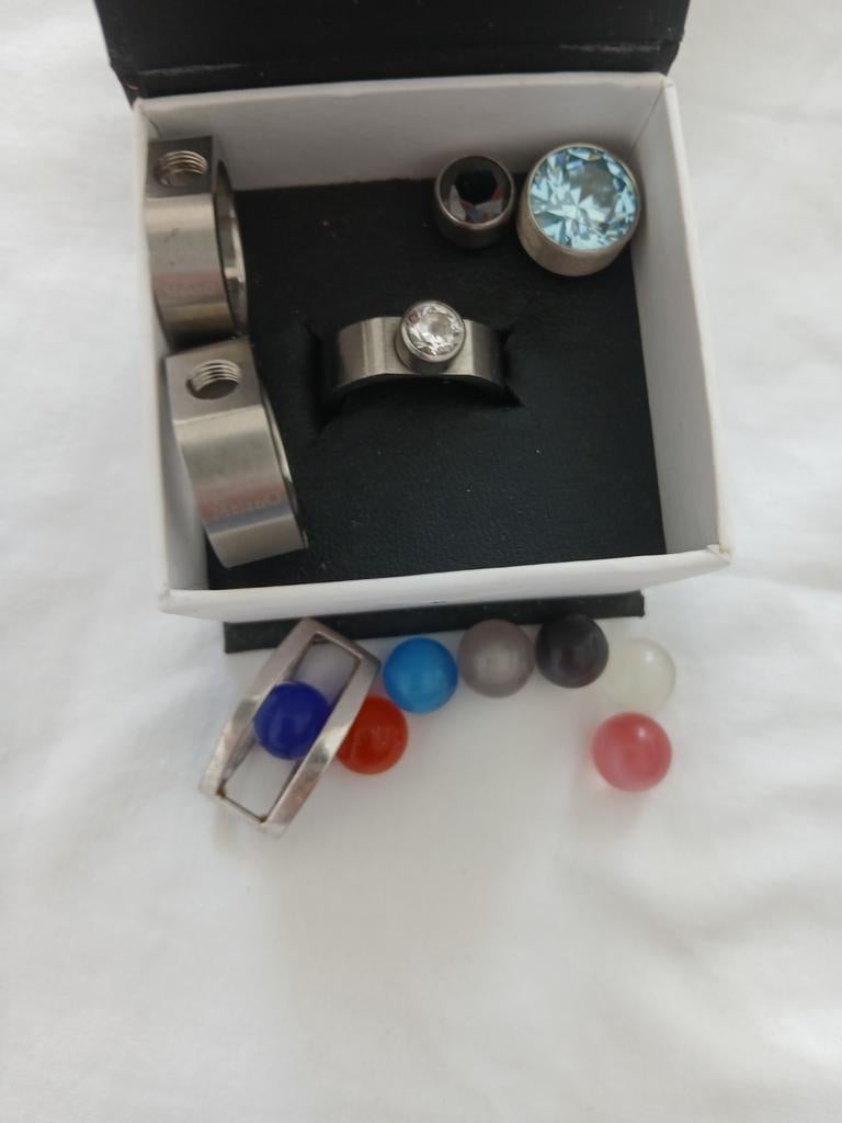 3 Melano ringen en een hanger, Ophalen of Verzenden, Zo goed als nieuw