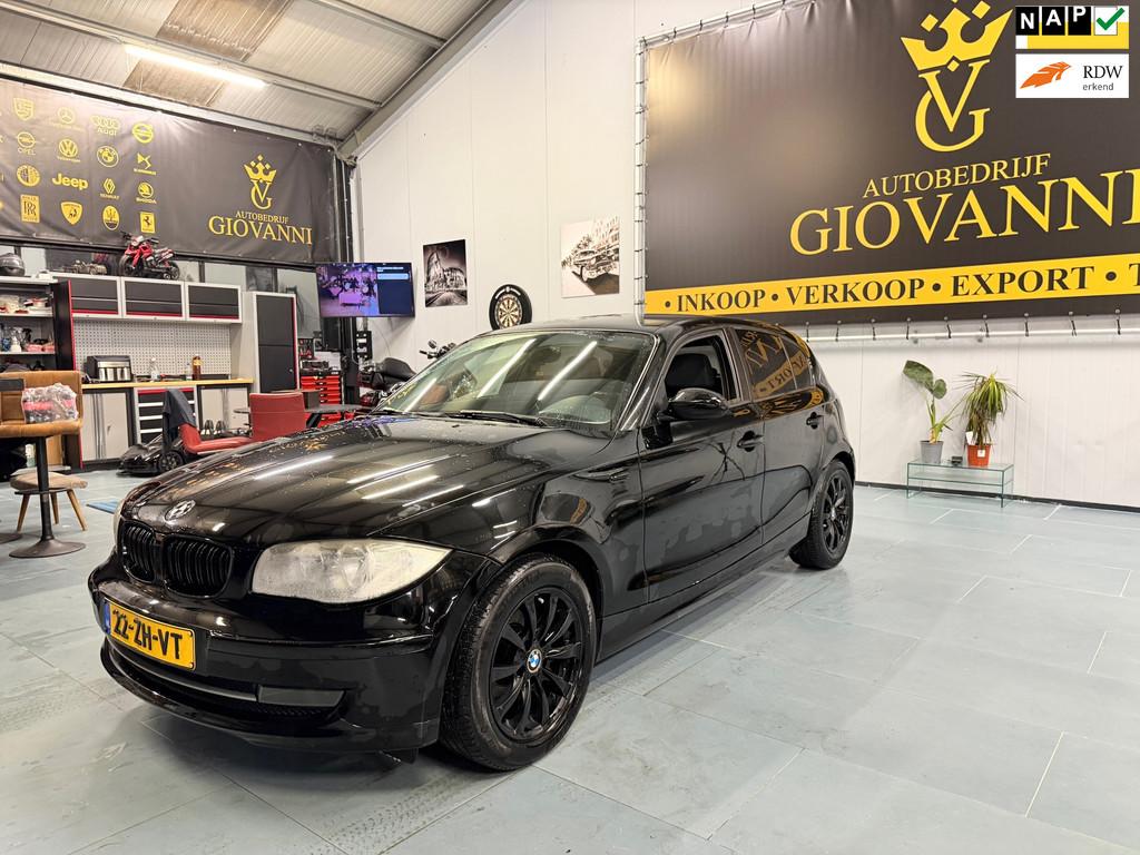 BMW 1-serie 118i High Executive INRUIL MOGELIJK, Auto's, BMW, 1-Serie, Achterwielaandrijving, Zwart, Origineel Nederlands