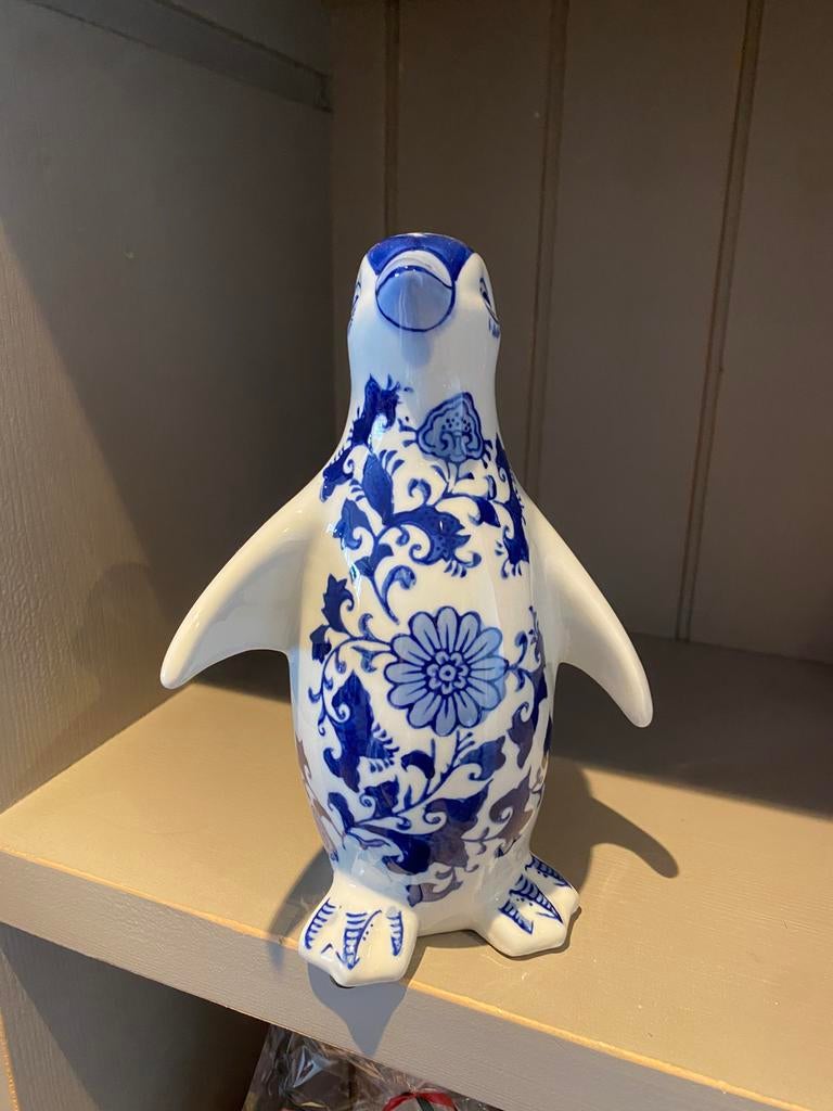 Pinguïn beeld, Ophalen