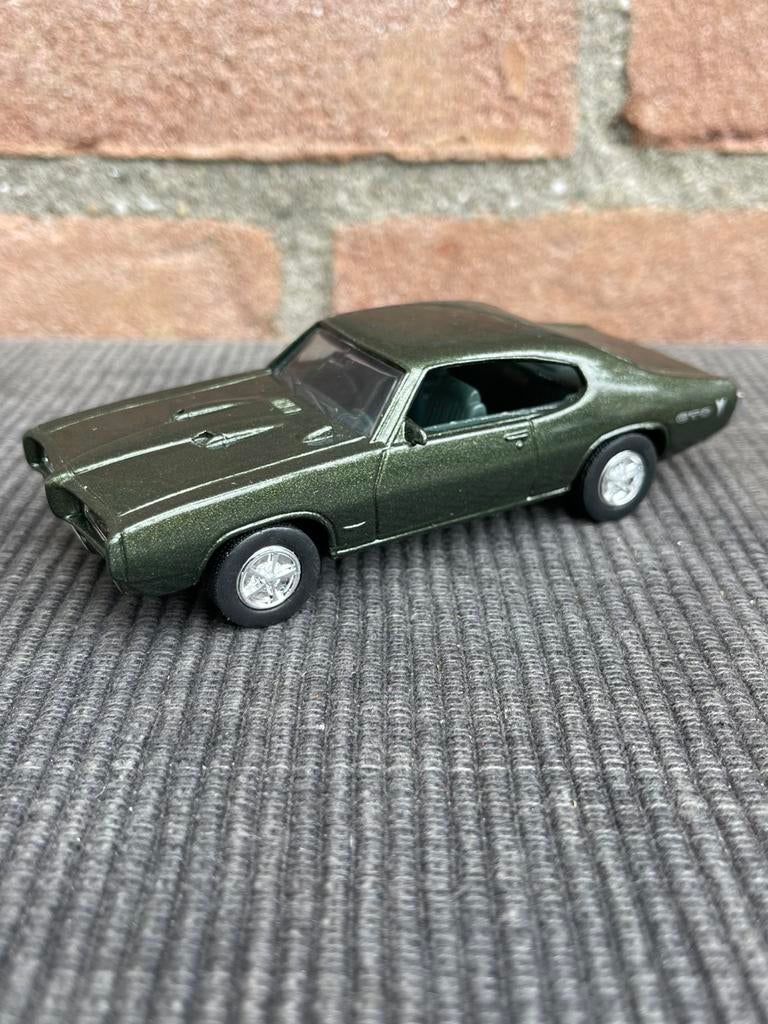 1:43 ERTL Pontiac, Hobby en Vrije tijd, Modelauto's | 1:43, Ophalen of Verzenden, Gebruikt, Auto, Overige merken