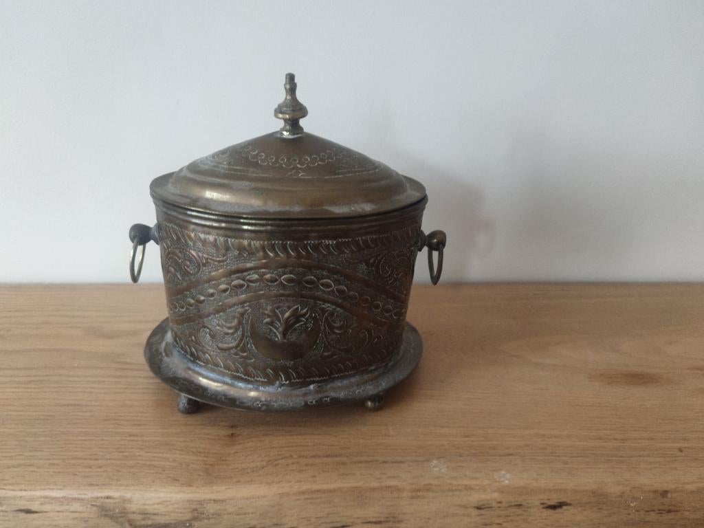 Antieke koperen tabakspot, Ophalen