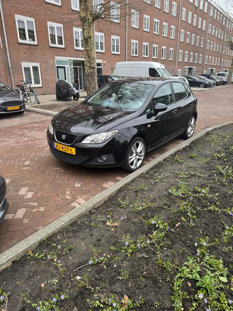 Seat Ibiza 1.4 63KW 5DRS 2009 Zwart, Auto's, Voorwielaandrijving, Stof, 40 €/maand, 4 cilinders