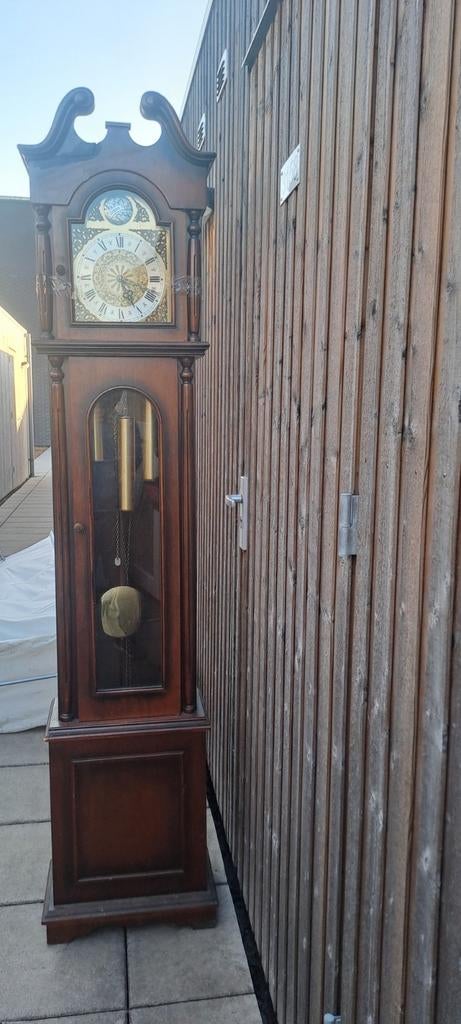 Antieke staande klok, Ophalen