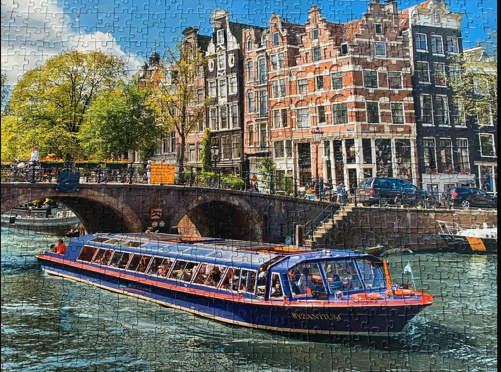 Ravensburger puzzel Grachtentocht door Amsterdam, Ophalen, 500 t/m 1500 stukjes, Zo goed als nieuw, Legpuzzel