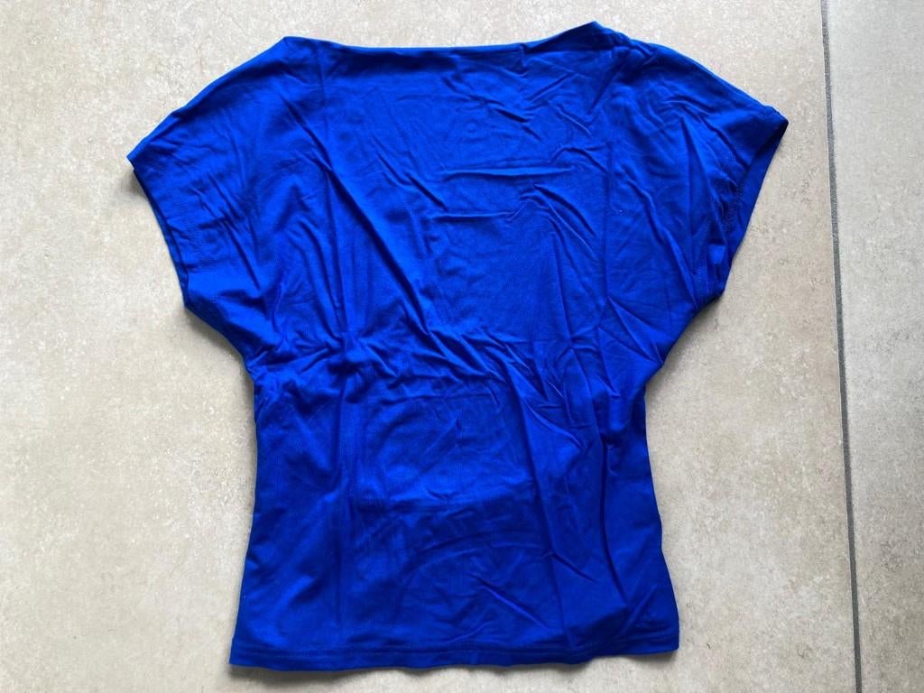 Blauw effen shirt met vleermuismouwen en open rug S, Blauw, Ophalen of Verzenden, Zo goed als nieuw, Korte mouw