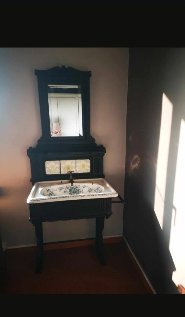 Antieke lavabo in gietijzer, Ophalen