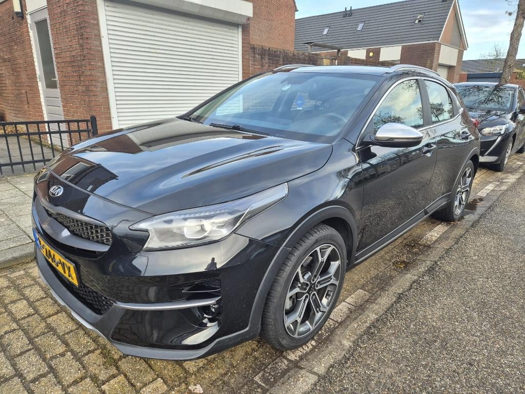 Kia XCeed 1.4 T-GDi (140 PK) Automaat - Dealer onderhouden, Auto's, Kia, XCeed, 1353 cc, Zwart, Leder en Stof
