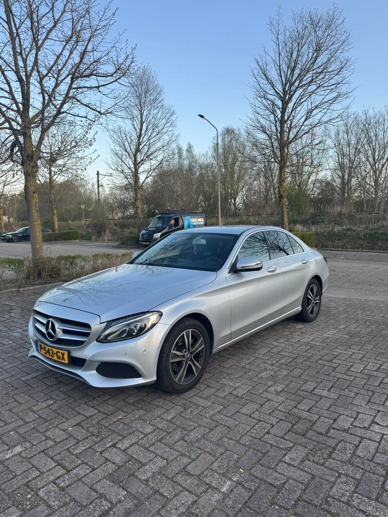Mercedes-Benz C-Klasse C180 1.6 115KW Aut7 2017 Grijs, Auto's, Mercedes-Benz, Automaat, Electronic Stability Program (ESP), 1800 kg