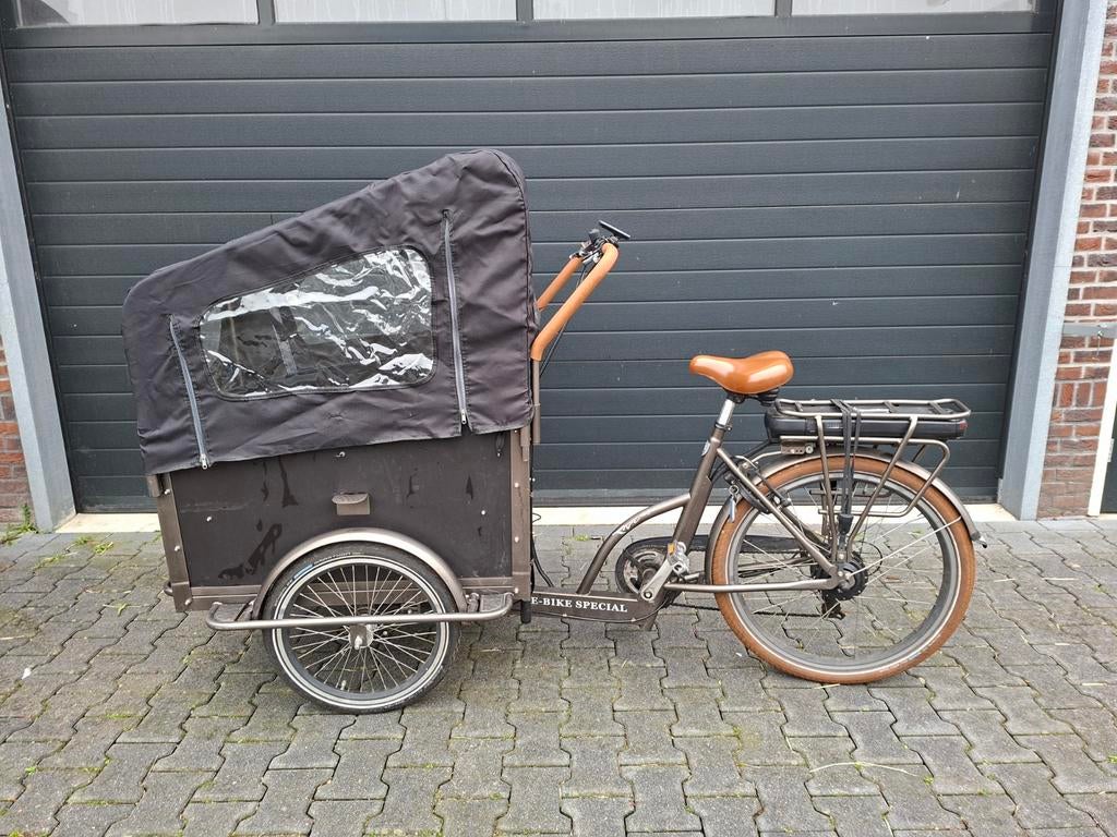 Bakfiets van Troy met Vogue accu - juli 2017, 4 kinderen of meer, Gebruikt, Huif, Ophalen