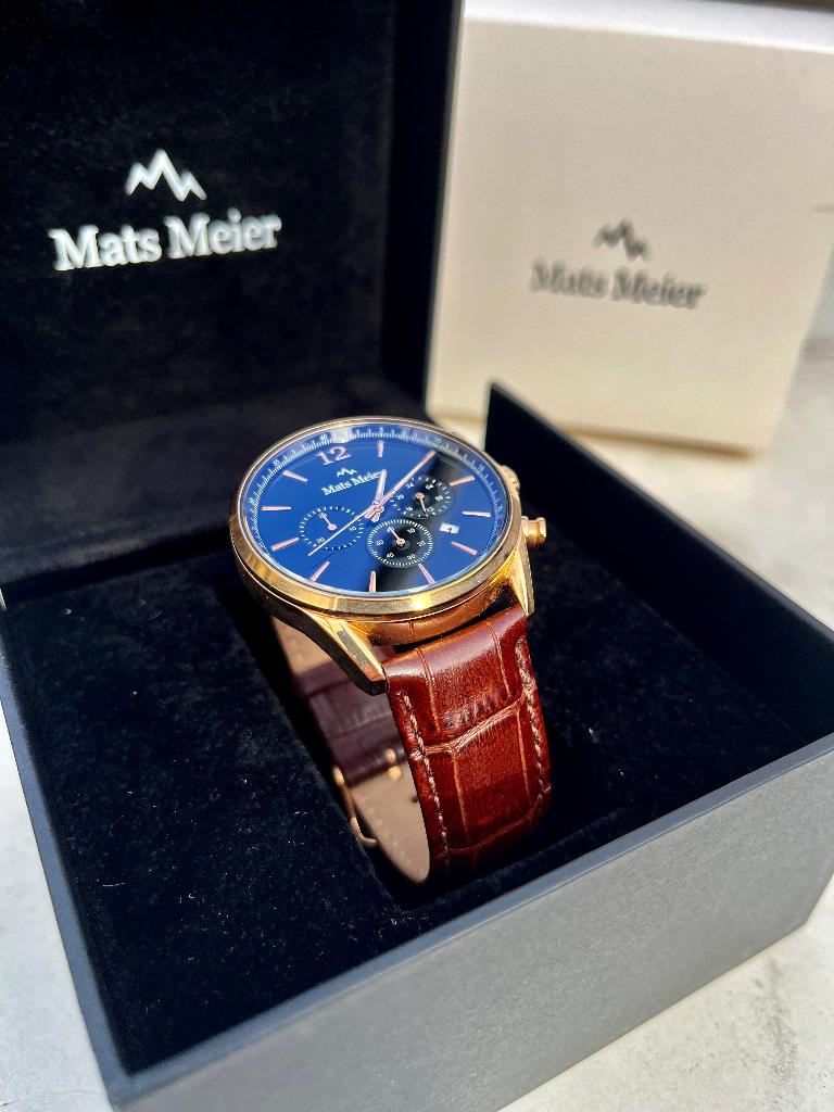 Luxe Mats Meier herenhorloge – blauw/goud, Overige merken, Leer, Polshorloge, Ophalen of Verzenden