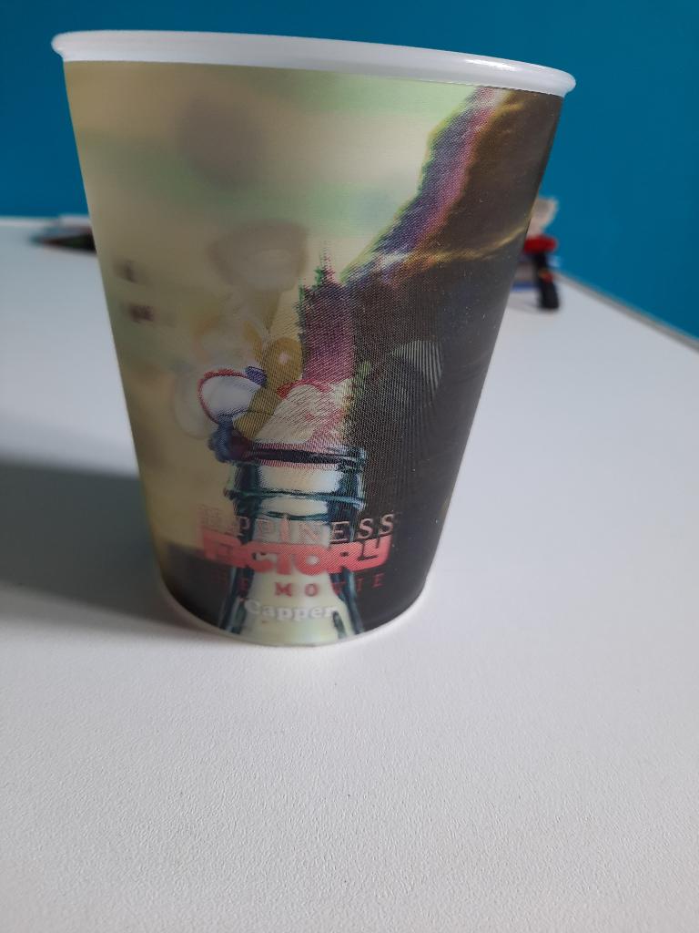 Coca Cola beker Happiness Factory the movie Capper, Ophalen of Verzenden, Gebruiksvoorwerp