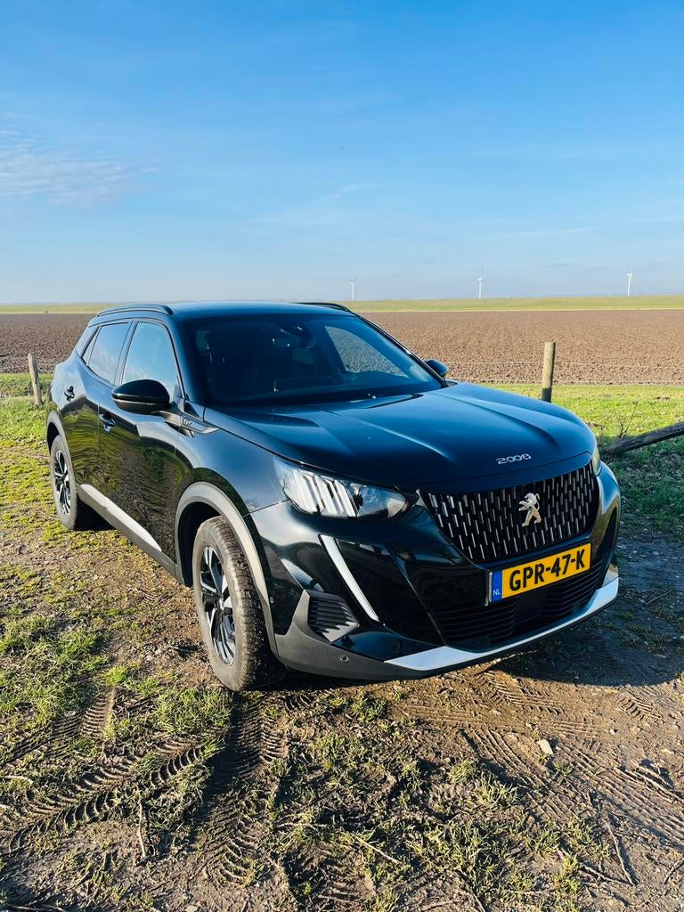 Peugeot 2008 1.2 Puretech 130pk 2023 Zwart, Auto's, Zwart, 1199 cc, Leder en Stof, Zwart
