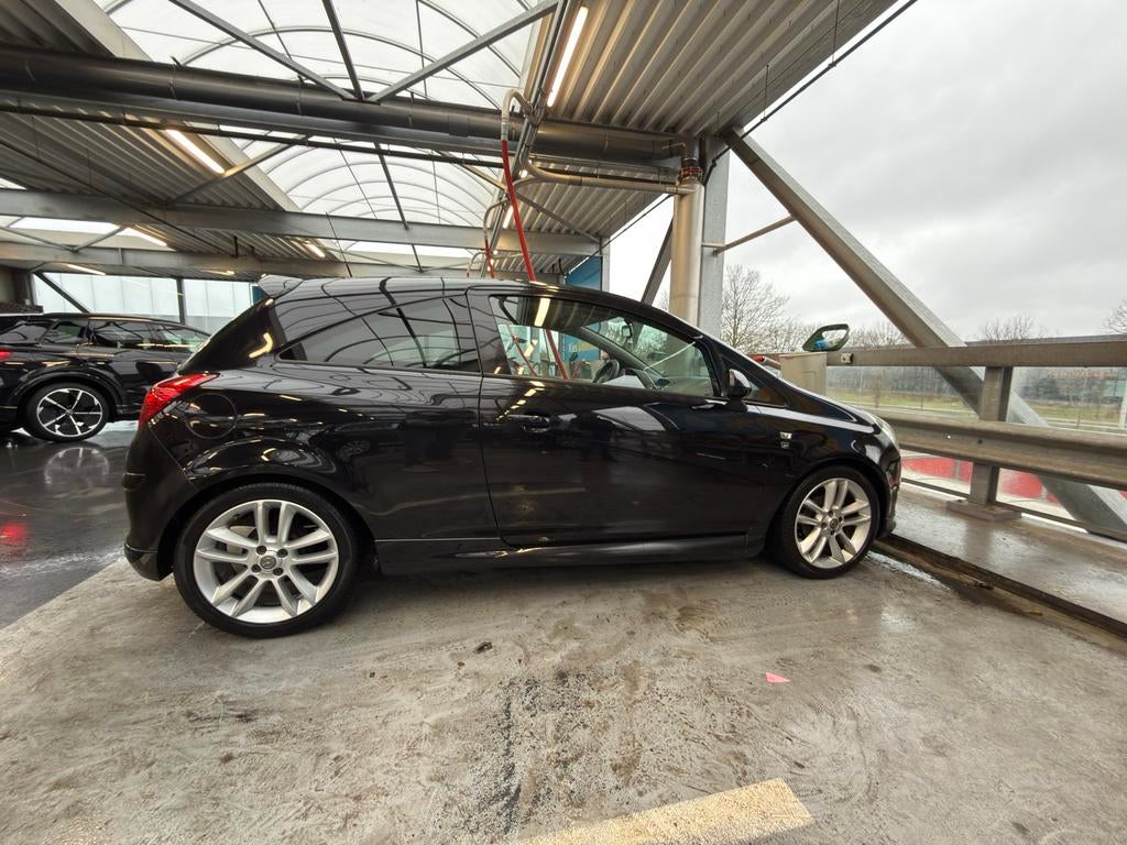 Opel Corsa 1.2 Ecoflex 51KW 3D 2011 Zwart, Auto's, Voorwielaandrijving, 450 kg, 40 €/maand, 4 cilinders