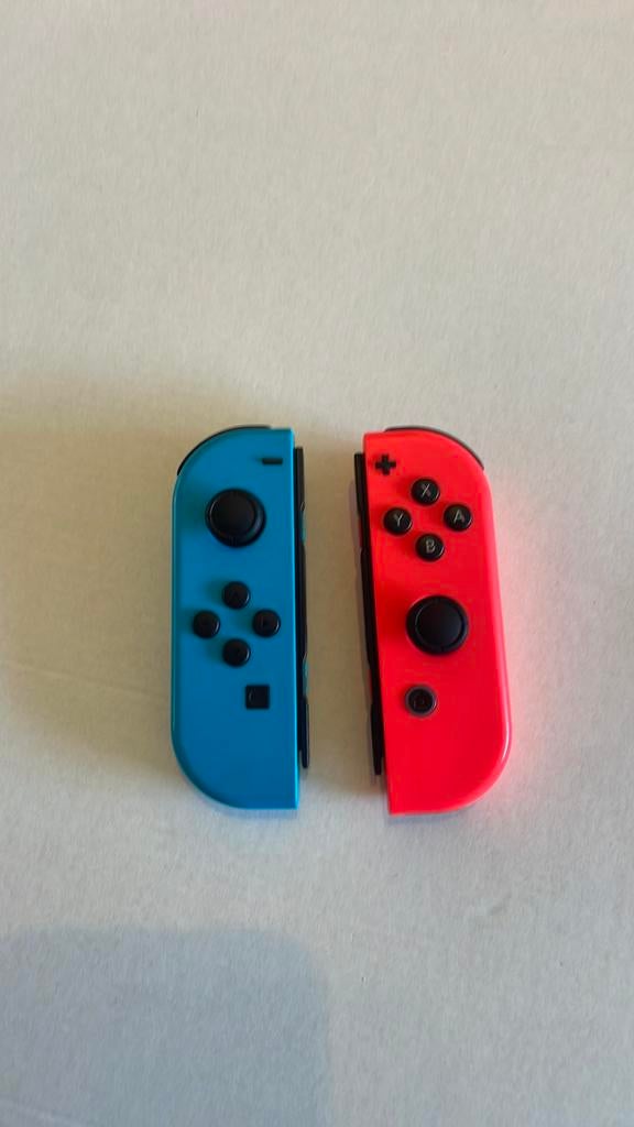 Originele Nintendo switch joy-cons rood en blauw, Fietsen en Brommers, Ophalen of Verzenden, Zo goed als nieuw