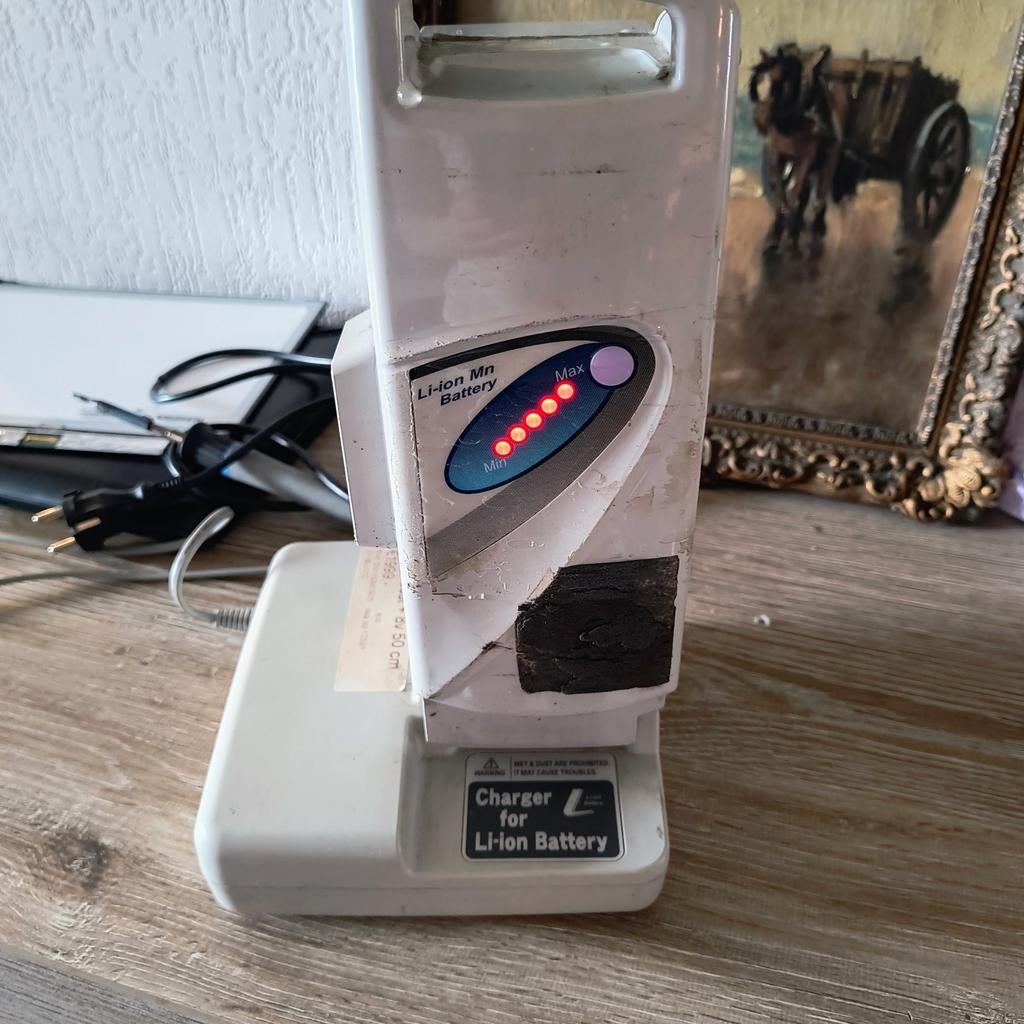 Panasonic puch E-bike accu 24V 14.5Ah+ oplader 35 km, Ophalen, Gebruikt