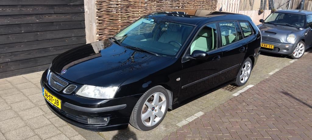 Saab 9-3 1.8 T Sport Estate AUT 2006 Zwart, 1998 cc, Beige, 4 cilinders, Leder en Stof