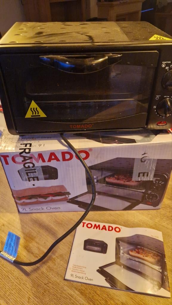 Tomado snackoven, Ophalen