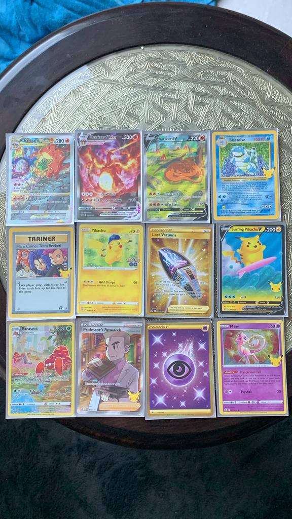 Pokémon kaarten - Charizard, Pikachu, Blastoise en meer, Ophalen, Zo goed als nieuw, Meerdere kaarten, Foil