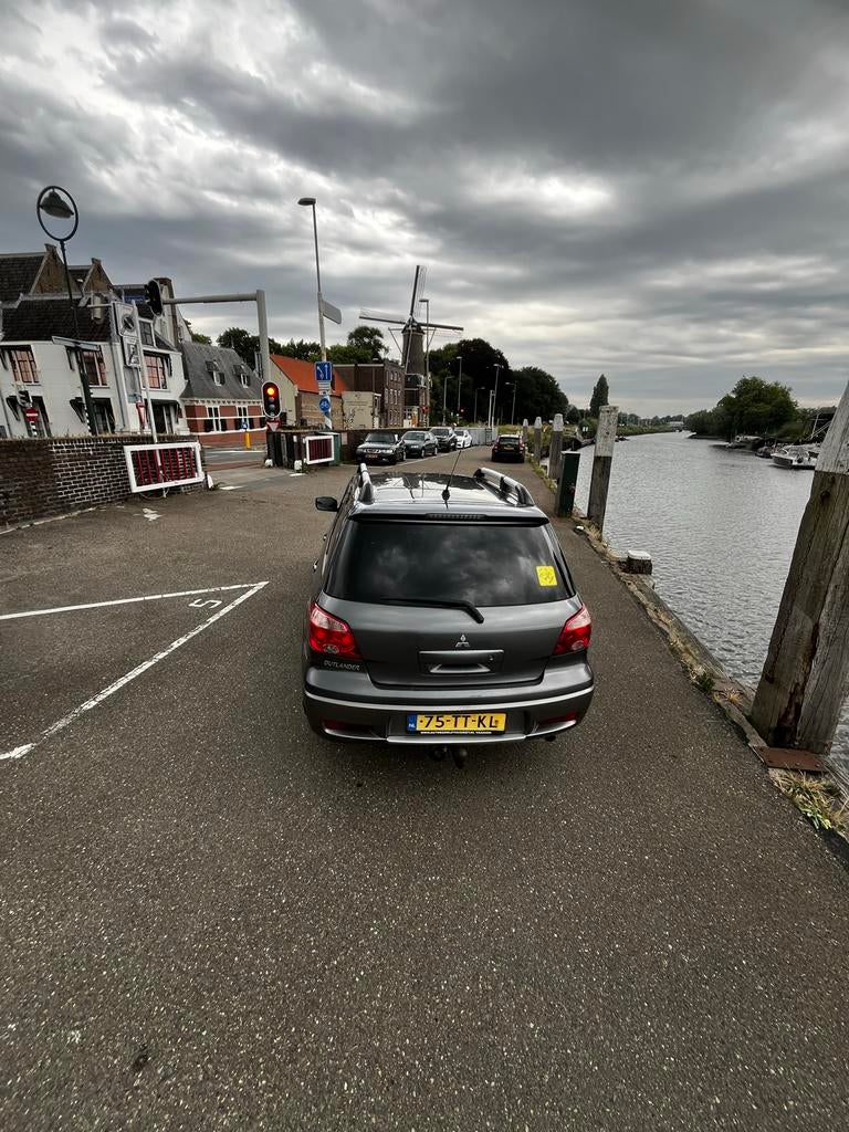 Mitsubishi Outlander 2.0 Lpg G3 MPI 2WD 2007 Grijs, Auto's, Mitsubishi, Voorwielaandrijving, Zwart, 75 €/maand, Handgeschakeld