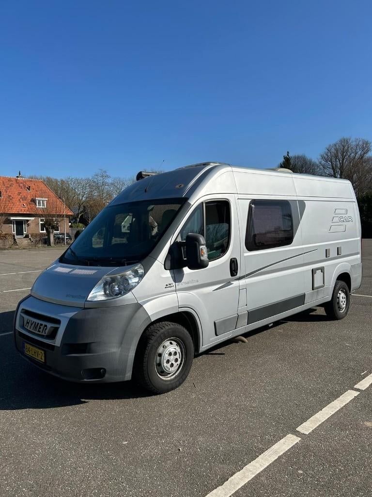 Hymer HC 322 2.3 D 2010 Grijs, Voorwielaandrijving, Stof, Beige, 4 stoelen