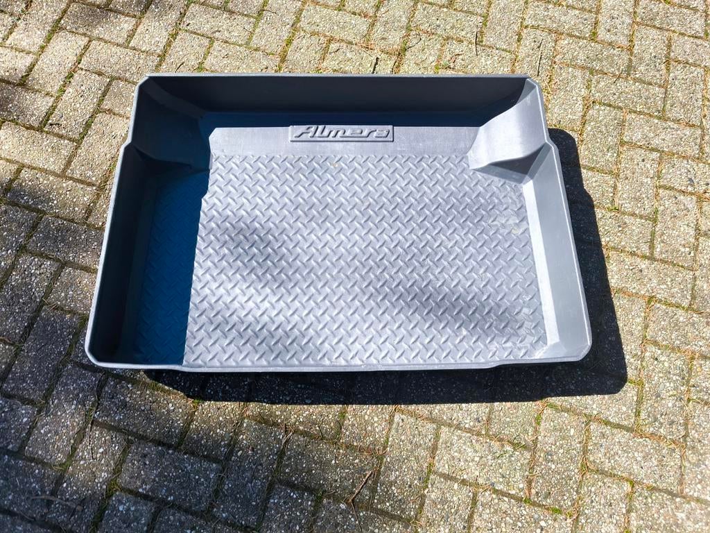 Kofferbak bak Nissan Almera, Ophalen