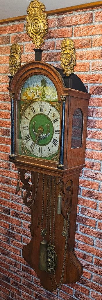 grote friese staart klok, Ophalen