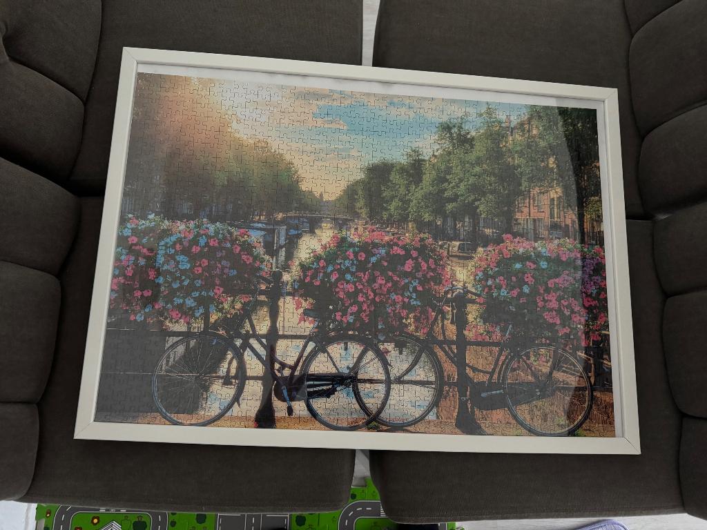 1000 puzzel in fotolijst Amsterdam, Ophalen of Verzenden, 500 t/m 1500 stukjes, Zo goed als nieuw, Legpuzzel