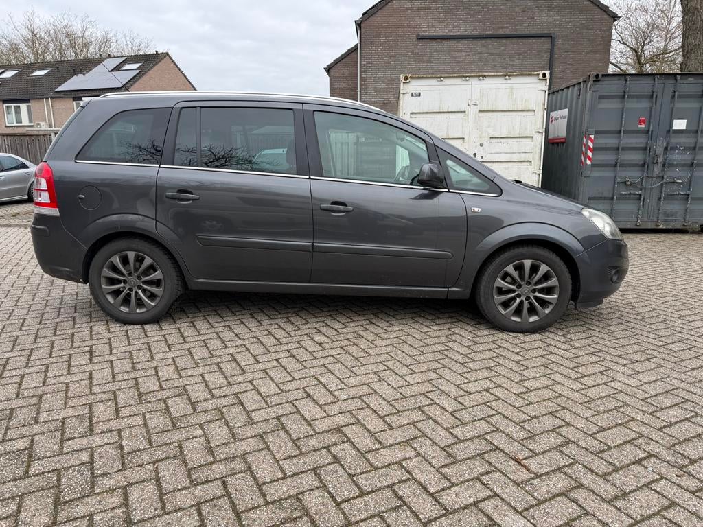 Te koop Opel Zafira 1.8  2011 Grijs 7 persoons en automaat!, Auto's, Euro 5, Stof, 4 cilinders, Zafira