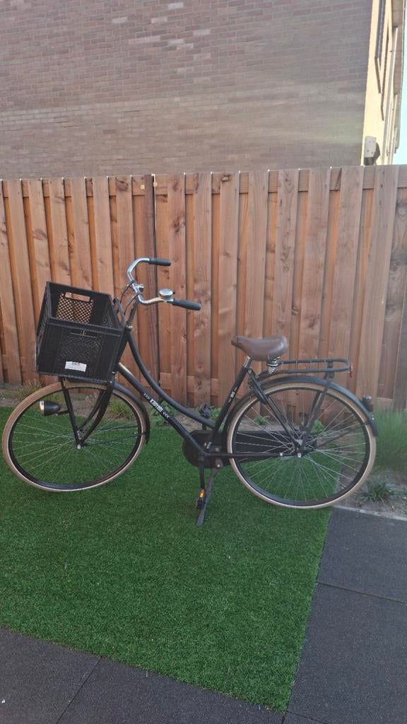 Damesfiets met krat, Ophalen