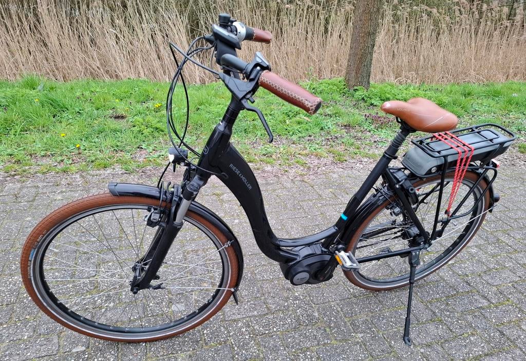 Zeer nette zwarte Riese Muller E-bike, Bosch middenmotor ✅, Ophalen, Zo goed als nieuw, Cortina, 50 km per accu of meer