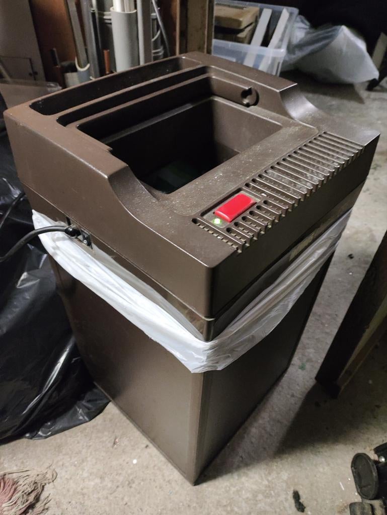 Intimus Simplex CSE papierversnipperaar, Ophalen