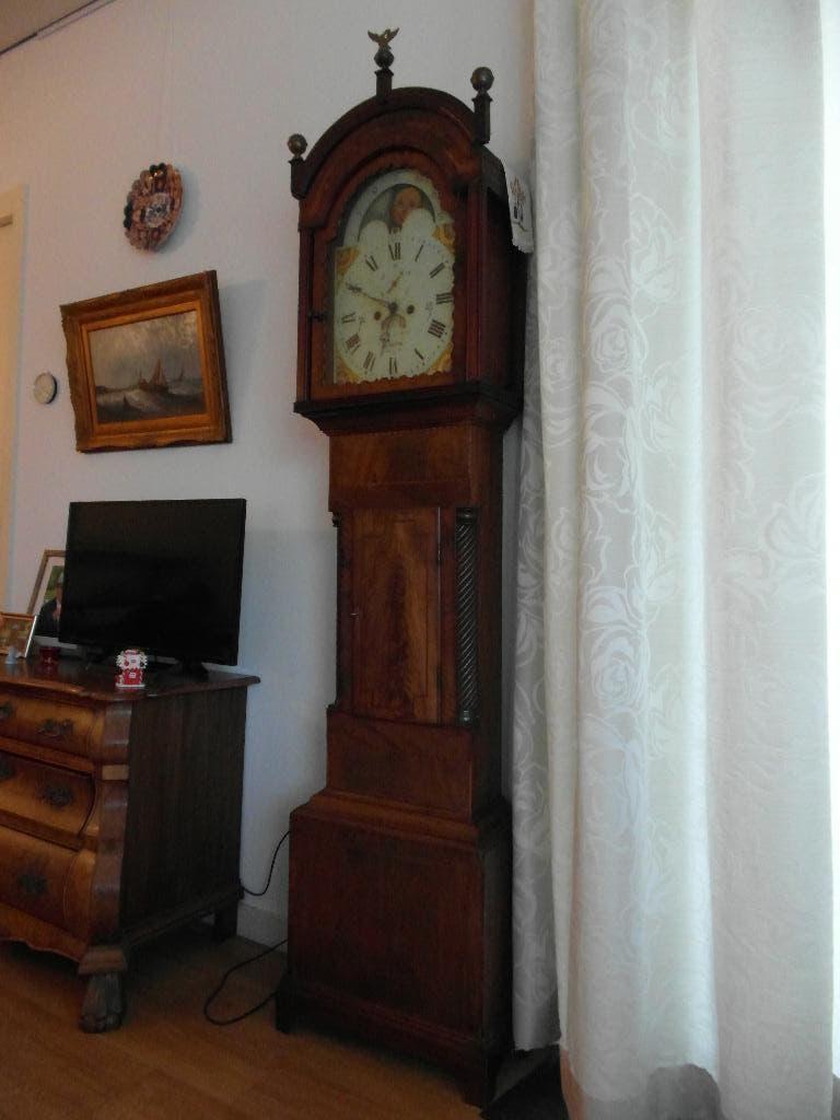 Staand antiek horloge, Ophalen