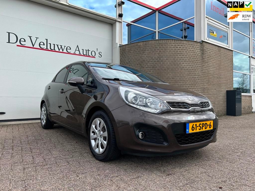 Kia Rio 1.2 CVVT Plus Pack|Trekhaak|Cruise|Airco|, Euro 5, Zwart, 4 cilinders, Bruin