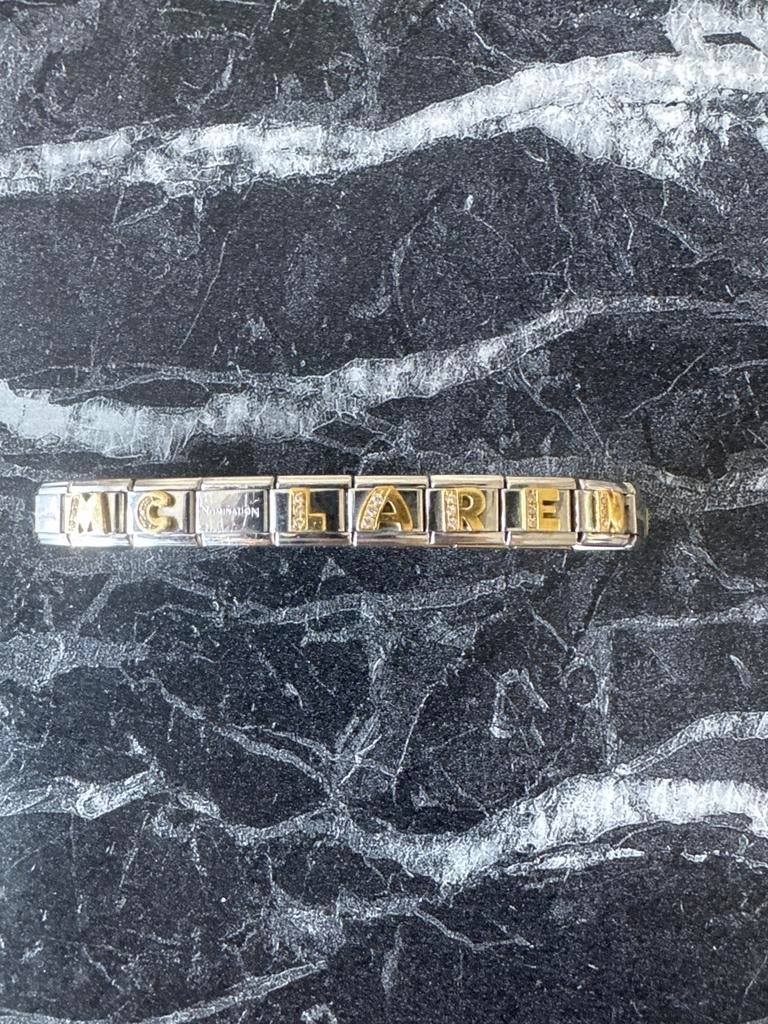 Nomination armband met McLaren Formule 1 tekst en steentjes, Staal, Ophalen of Verzenden, Zo goed als nieuw, Zilver