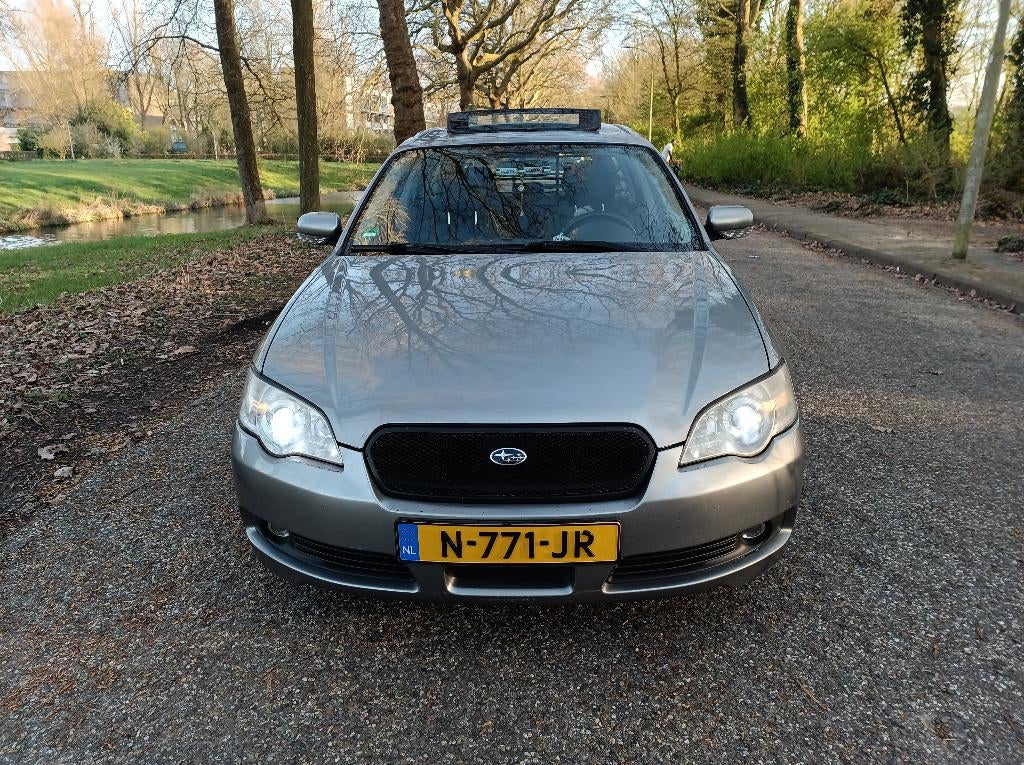 Subaru Legacy 3.0 R TW AUT AWD 2006 Grijs, Auto's, Subaru, Automaat, Stoelverwarming, Zwart, Stationwagon