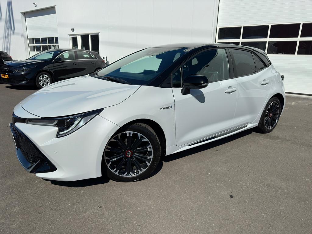 Toyota Corolla 1.8 Hybrid GR-Sport Half leder Achteruitrijca, Auto's, Toyota, Gebruikt, Zwart, 4 cilinders, 98 pk