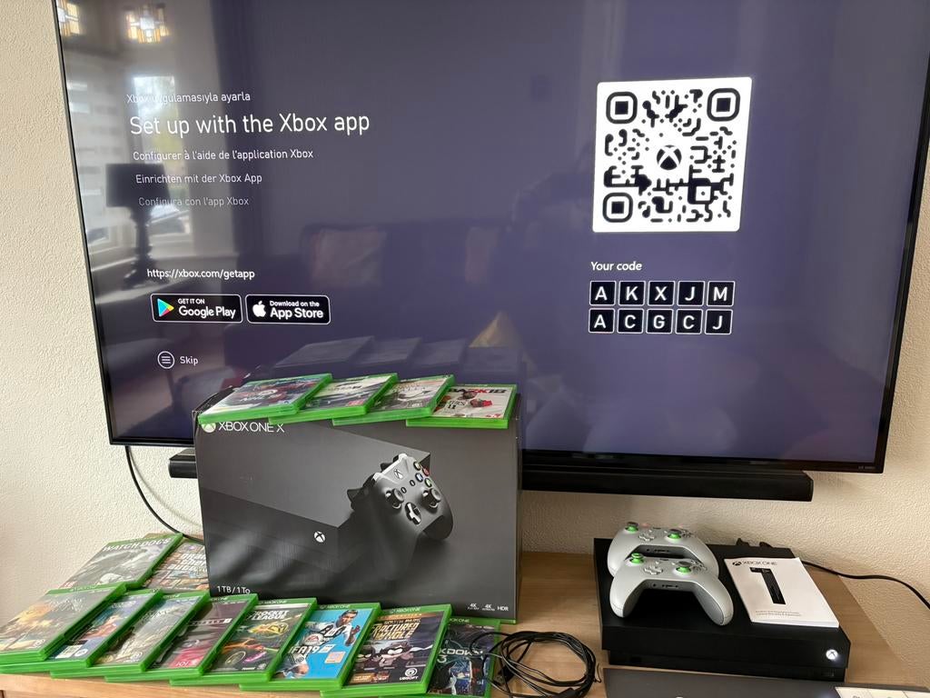 Xbox One X (1TB) compleet in doos met 2 controllers en games, Met games, Met 2 controllers, Ophalen of Verzenden, Zo goed als nieuw