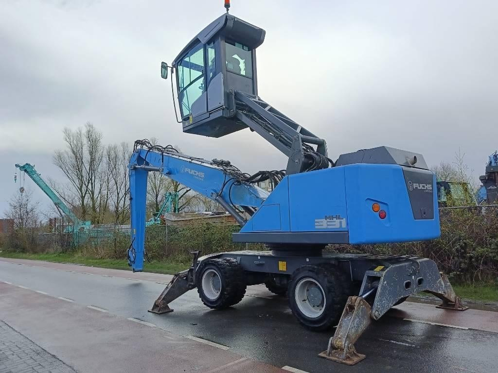 Fuchs MHL 331 overslagkraan waste handler umslag bagger, Kraan