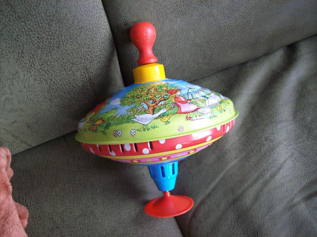 25x58omtrek mooie blikken draaitol, Ophalen