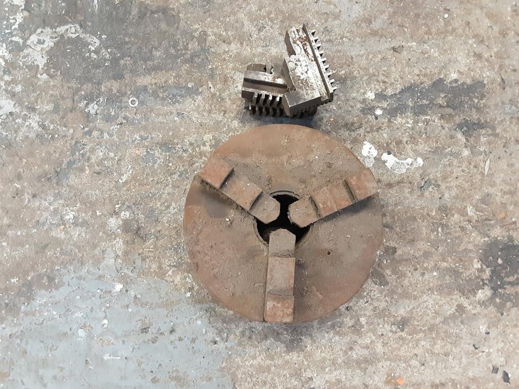 Klauwplaatje draaibank, Ophalen