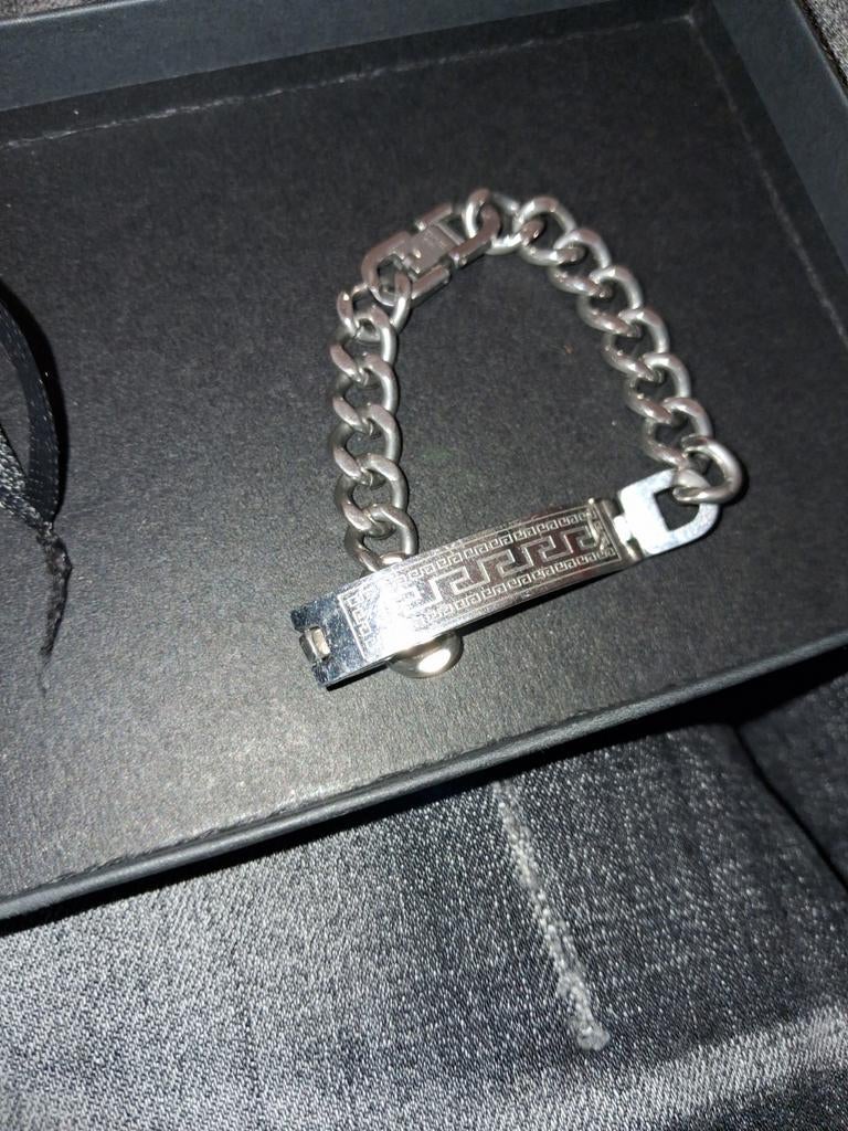 Zilverkleurige armband met Grieks patroon, Sieraden, Tassen en Uiterlijk, Armbanden, Gebruikt, Overige materialen, Zilver, Ophalen of Verzenden