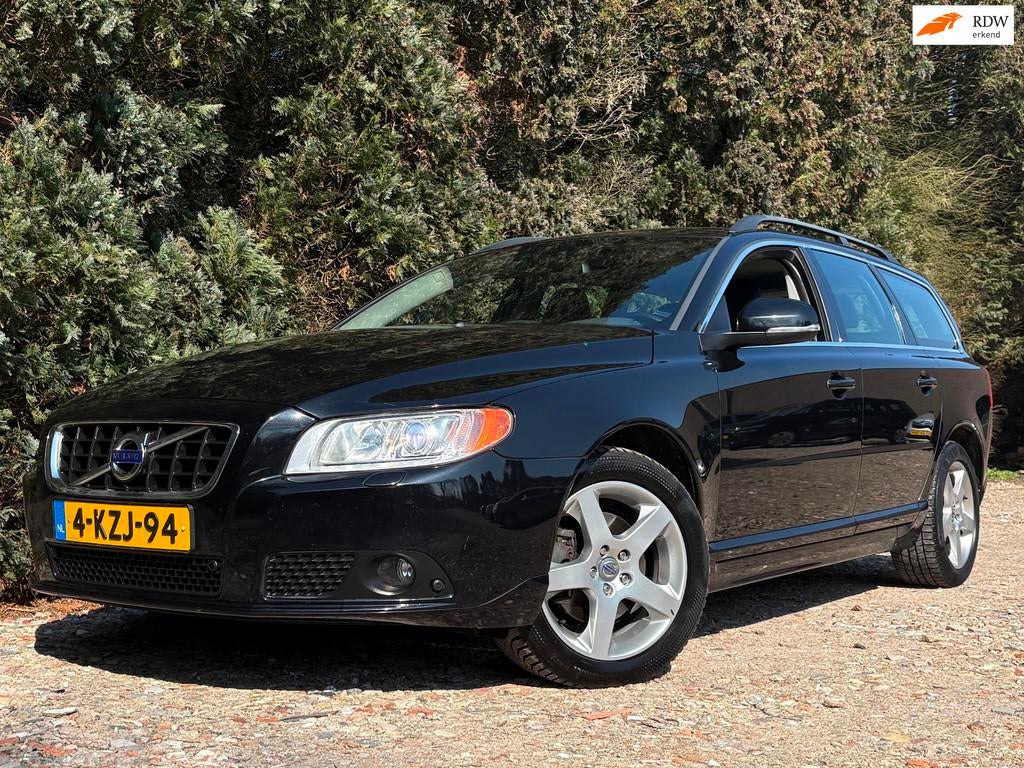 Volvo V70 1.6 T4 Limited Edition | Automaat | Dealer Onderho, Auto's, 4 cilinders, Navigatiesysteem, Zwart, 1600 kg