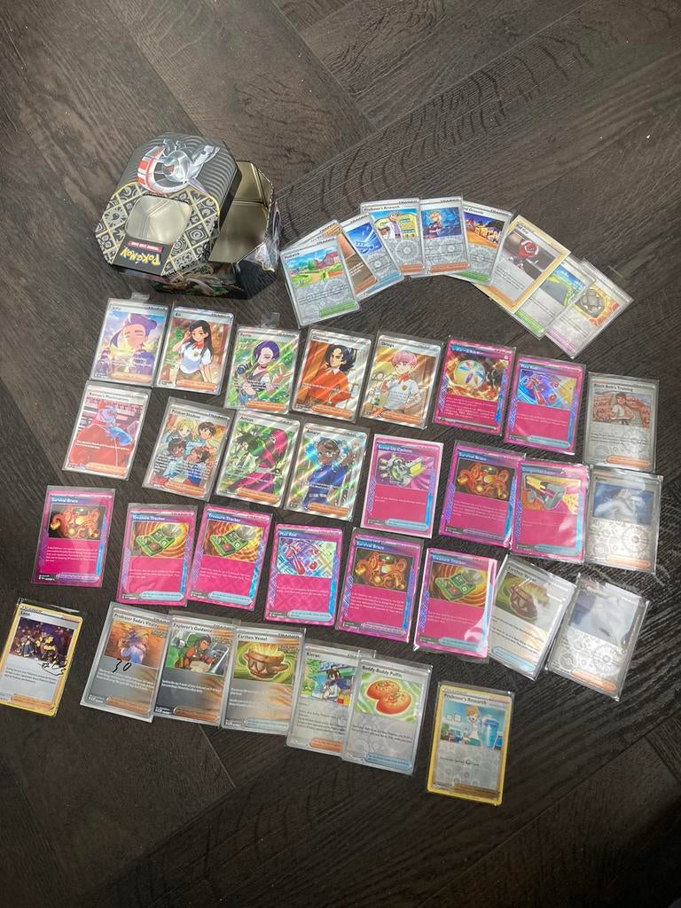 Pokemon kaarten lot trainer holo’s met inclusief blik / tin, Ophalen of Verzenden, Zo goed als nieuw, Meerdere kaarten