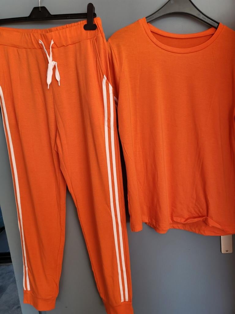 Oranje. Set maat L nieuw, Kleding | Dames, Sportkleding, Maat 42/44 (L), Oranje, Ophalen of Verzenden, Fitness of Aerobics