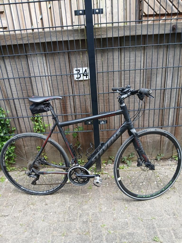 Stevens hybride fiets, Fietsen en Brommers, Fietsen | Heren | Sportfietsen en Toerfietsen, Ophalen, Zo goed als nieuw, Meer dan 20 versnellingen