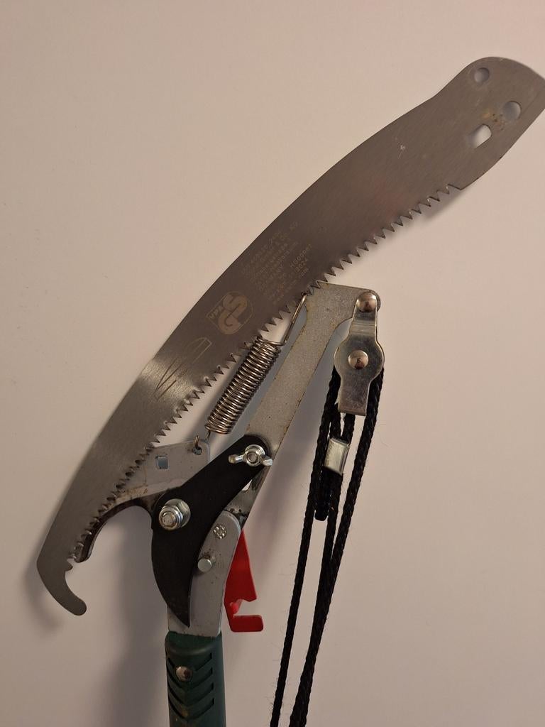 Parkside takkenschaar met zaag, Ophalen