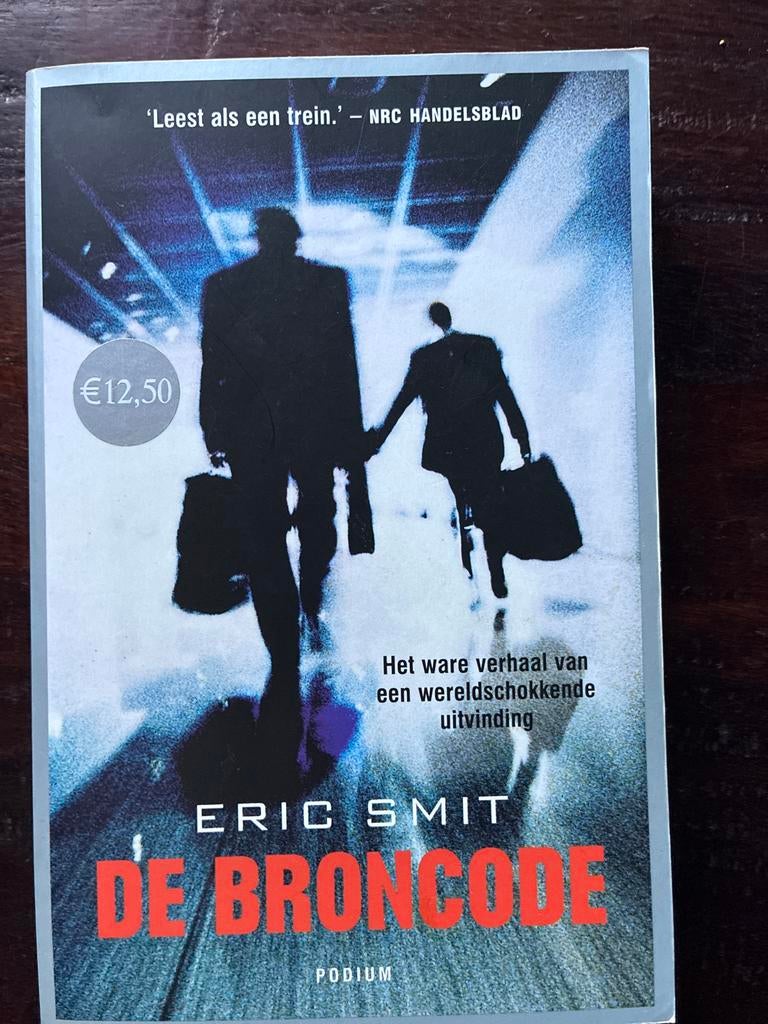 De Broncode - Eric Smit / NIEUWSTAAT, Ophalen of Verzenden, Zo goed als nieuw, Nederland