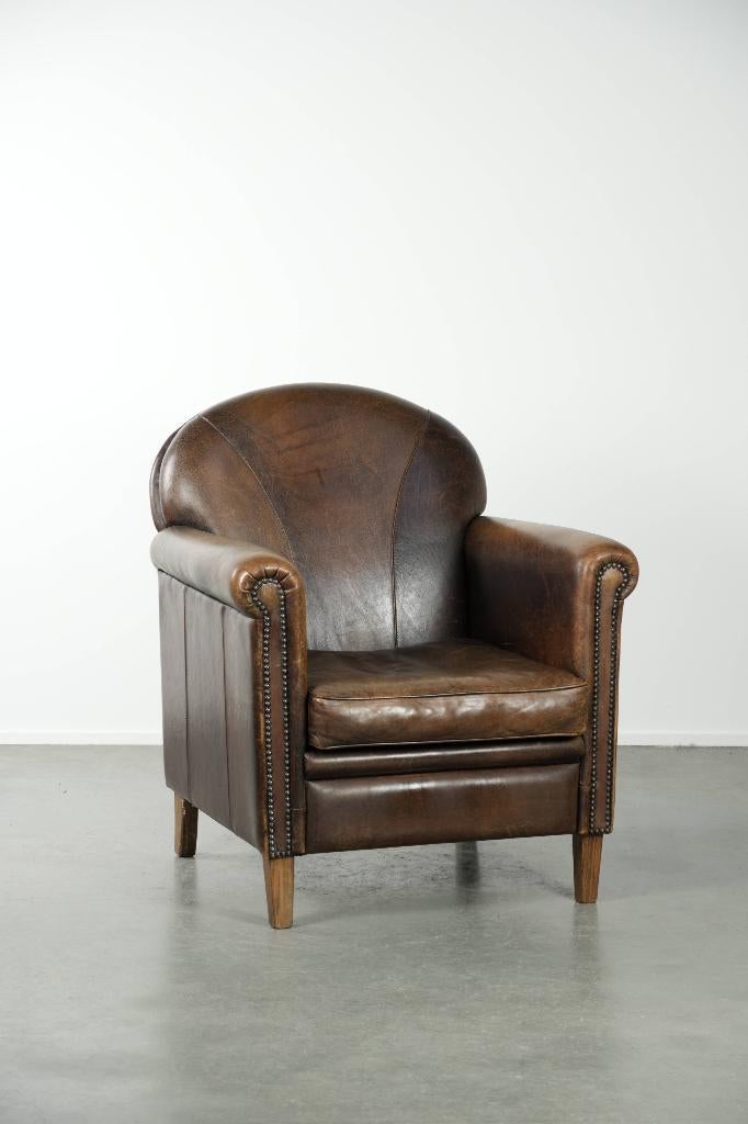 Tijdloze fauteuil van schapenleer met karaktervol patina, Ophalen, Gebruikt, ., Klassiek