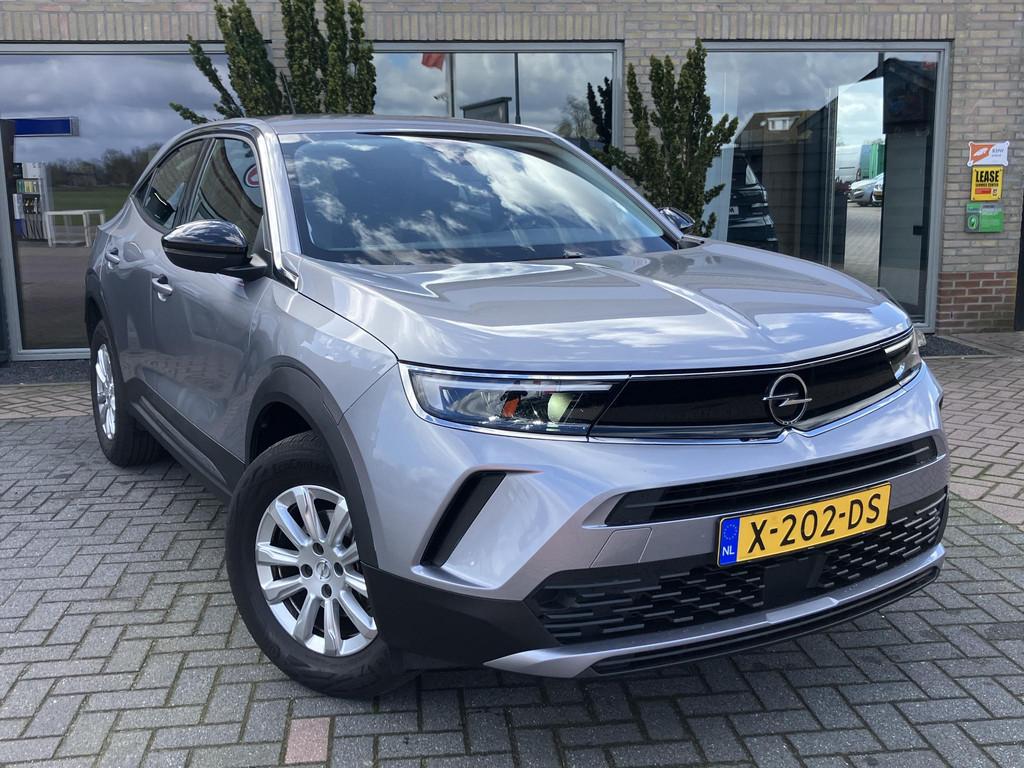 Opel Mokka 1.2 | Camera | Carplay | 12 mnd garantie, Stof, Gebruikt, 1199 cc, Parkeersensor
